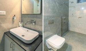 2 fotos de un baño con lavabo y aseo en Treebo RC Comforts, en Chikmagalur 39 fotos más