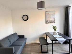 Posezení v ubytování Park Street Accommodation Room 6 + 9 fotografií