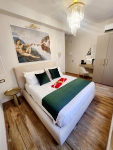 Postel nebo postele na pokoji v ubytování Golden Palace Luxury Guest House