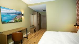 A bed or beds in a room at Porta e Alpeve