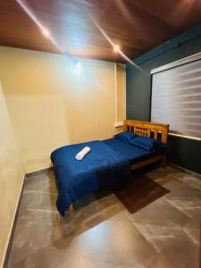 Postel nebo postele na pokoji v ubytování Elora Resort Wayanad