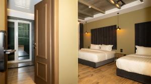 A bed or beds in a room at Porta e Alpeve