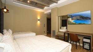 A bed or beds in a room at Porta e Alpeve