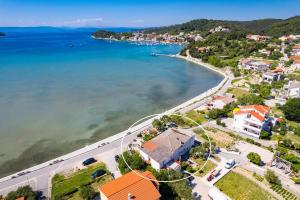 an aerial view of a town and the water at Apartments Emily in Kampor