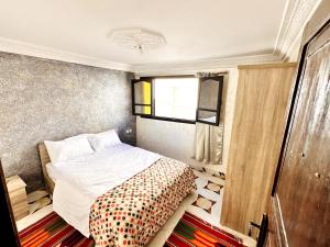 Letto o letti in una camera di Atlas Hostel Taghazout