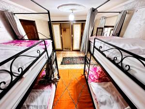 Letto o letti in una camera di Atlas Hostel Taghazout