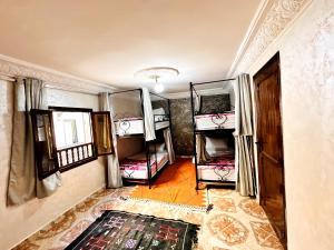 Letto o letti in una camera di Atlas Hostel Taghazout