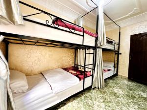 Letto o letti in una camera di Atlas Hostel Taghazout
