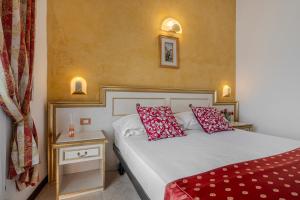 Postel nebo postele na pokoji v ubytování Hotel King