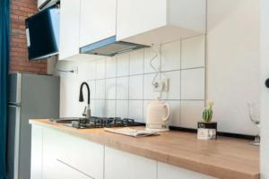 Kuchyň nebo kuchyňský kout v ubytování Epic 1Bed unit Huge Balcony area