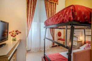 Postel nebo postele na pokoji v ubytování Hotel King