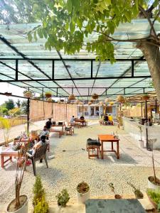 Restaurace v ubytování TLO - The Life Outdoor, Bir Billing