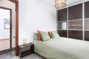 Ένα ή περισσότερα κρεβάτια σε δωμάτιο στο Home2Book El Cotillo Duplex Apt, Coastal Paradise