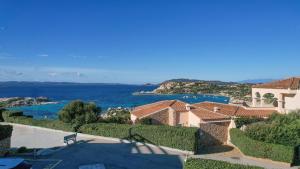 a house with a view of the ocean at Borgo Punta Tegge il mare la spiaggia il tramonto in La Maddalena