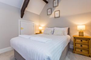 Postel nebo postele na pokoji v ubytování St Andrews Court