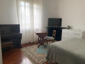 TV a/nebo společenská místnost v ubytování Casa di Terry