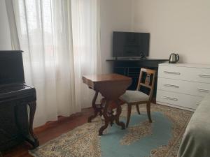 TV a/nebo společenská místnost v ubytování Casa di Terry