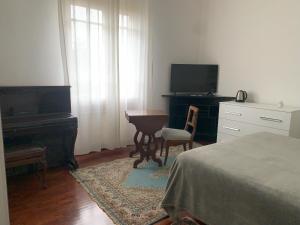 TV a/nebo společenská místnost v ubytování Casa di Terry