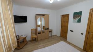 TV o dispositivi per l'intrattenimento presso Oskolok Dovbusha Mini-Hotel