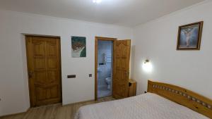 Letto o letti in una camera di Oskolok Dovbusha Mini-Hotel