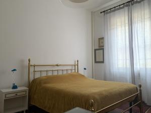 Postel nebo postele na pokoji v ubytování Casa di Terry