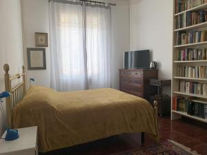 Postel nebo postele na pokoji v ubytování Casa di Terry