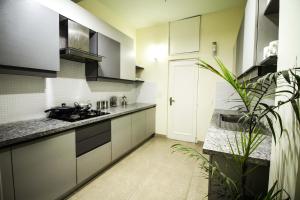 Eldhús eða eldhúskrókur á Anara Service Apartments - Greater Kailash Part II
