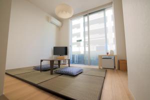 TV a/nebo společenská místnost v ubytování Kyo-wa Hotel