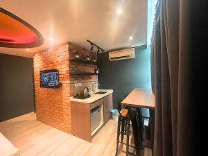 Kuchyň nebo kuchyňský kout v ubytování Smile Hotel Seri Kembangan