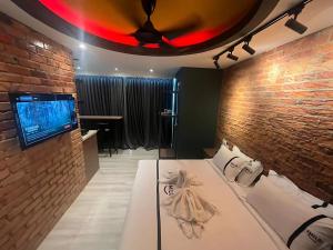 TV a/nebo společenská místnost v ubytování Smile Hotel Seri Kembangan