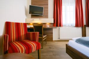 Μια τηλεόραση ή/και κέντρο ψυχαγωγίας στο Gasthof Hotel Jägerwirt