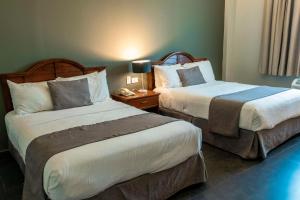 Postel nebo postele na pokoji v ubytování Best Western PLUS Los Mochis