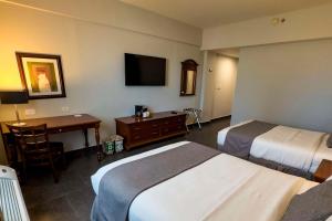 Postel nebo postele na pokoji v ubytování Best Western PLUS Los Mochis