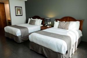 Postel nebo postele na pokoji v ubytování Best Western PLUS Los Mochis