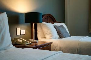 Postel nebo postele na pokoji v ubytování Best Western PLUS Los Mochis