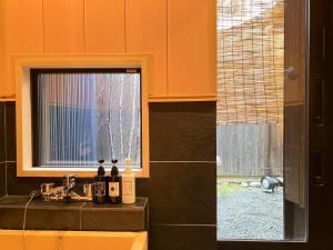 Fotografie z fotogalerie ubytování 京一軒町家 さと居 鉄仙 SATOI TESSEN Omiya-Gojo v Kjótu