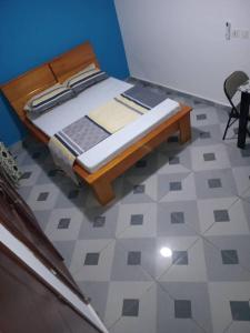 En eller flere senge i et værelse på Kimtoou résidence + 3 billeder