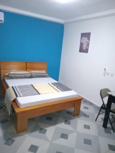 En eller flere senge i et værelse på Kimtoou résidence