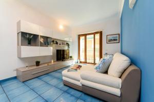 Ruang duduk di AMORE RENTALS - Appartamento Louise