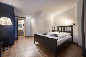 Postel nebo postele na pokoji v ubytování Apartments No7 Sella
