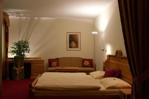 Postel nebo postele na pokoji v ubytování Hotel Lizumerhof