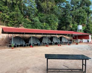 Πινγκ πονγκ στο The nest bettathur Coorg campsite ή εκεί κοντά