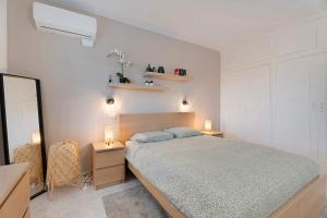 En eller flere senge i et værelse på Casa Noa + 16 billeder