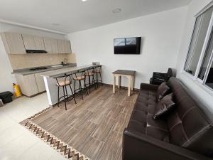 Kuchyň nebo kuchyňský kout v ubytování APARTAHOTEL DON BELI