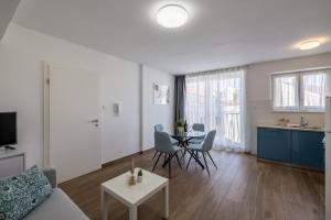 TV a/nebo společenská místnost v ubytování Sara Apartment