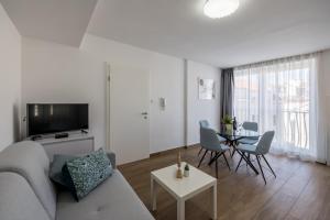 TV a/nebo společenská místnost v ubytování Sara Apartment