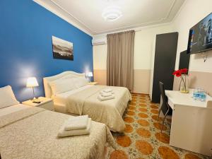 Postel nebo postele na pokoji v ubytování Villa Matilde