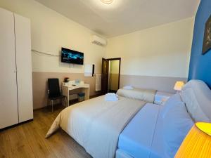 Postel nebo postele na pokoji v ubytování Villa Matilde