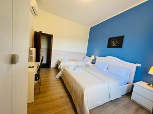 Postel nebo postele na pokoji v ubytování Villa Matilde