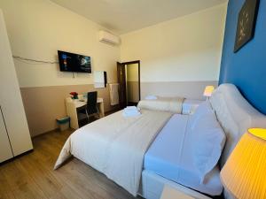 Postel nebo postele na pokoji v ubytování Villa Matilde